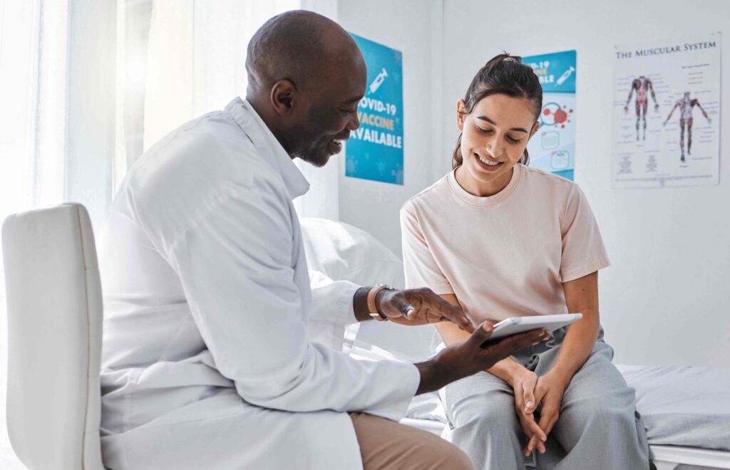 A doctor and a patient in a random medical room for Blue Ridge Medical Center